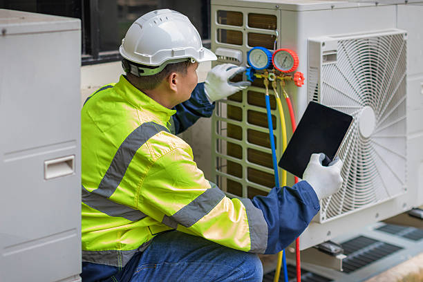 Professional Air Conditioning Repair technician working in Mapleton, IL